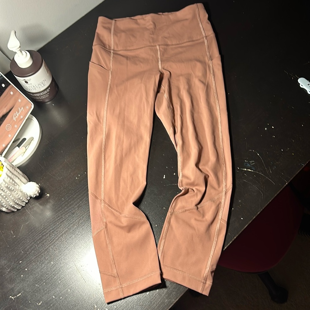 Like new Lululemon leggings, size 4, dusty pink color